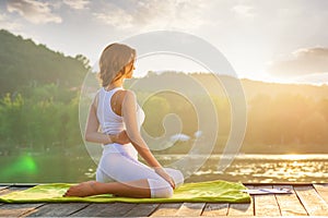 Woman Yoga - relax in nature photo