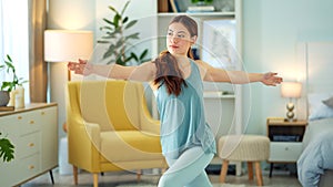 Woman, yoga and stretching in home living room for wellness, fitness and relax for mind, body and zen. Girl, exercise