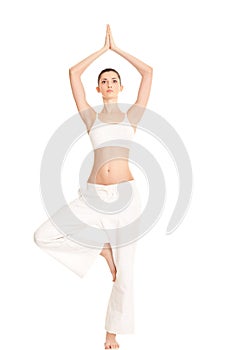 Woman in yoga tree-pose