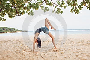 woman yoga young gymnastics training sport lifestyle calm exercise bridge beach