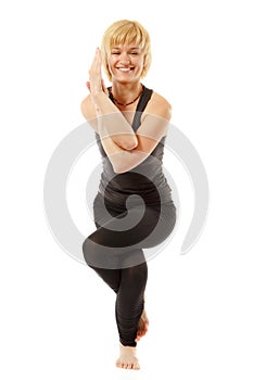 Woman yogi in yoga pose on white