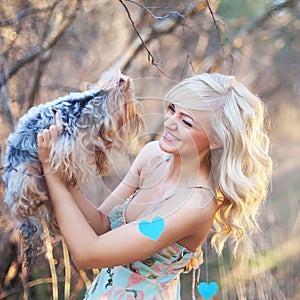 Woman with yorkshire terriers