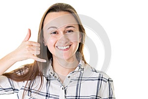 Woman young doing phone gesture call me back with hand and fingers like talking on the telephone isolated on white background