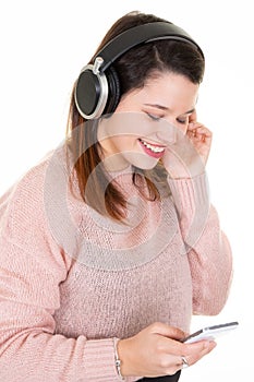 Woman young listening to music on the phone girl student