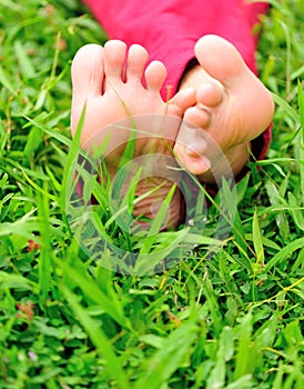 Womans barefeet on grass