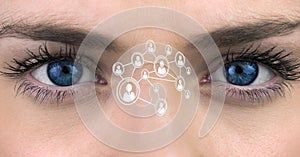 Womans blue eyes with interface screen
