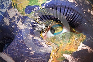 Womans face with planet Earth texture and bahamas flag inside the eye