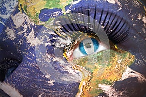 Womans face with planet Earth texture and guatemalan flag inside the eye