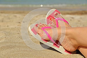 Womans feet with flip flops