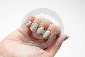 Womans hands with summer nail. Fresh manicure isolated on white background