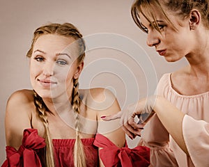 Women accusing each other of something