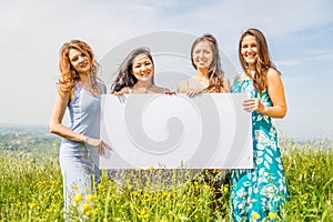 Women with advertising board