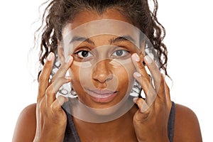 Women applying concealer