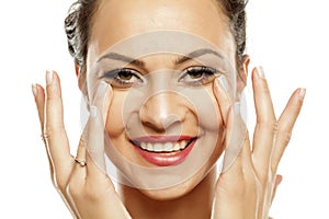 Women applying concealer