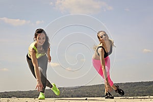 women athletes do exercises, training