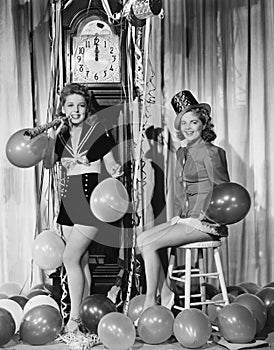 Women with balloons on New Years Eve