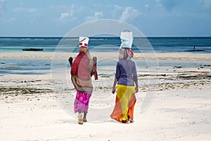 Women at the beach, Zanzibar island, Tanzania