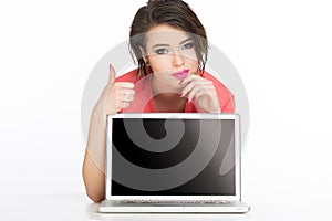 Women behind laptop with like thumb