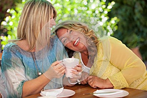 Women, best friends laughing