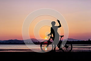 Women bike at clean beach