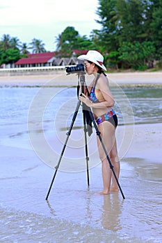 Women bikini body with camera