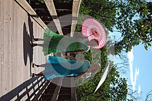 Women on boardwalk photo