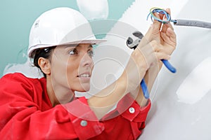 Women builder with construction tools