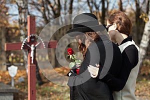 Women on the cemetery