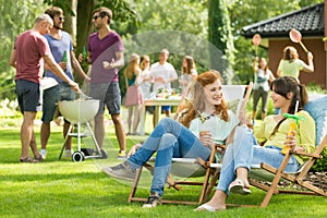 Women chatting on a garden party