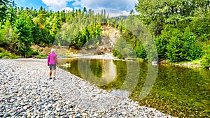 Women checking for Salmon in the Coldwater River near Brookmere in BC Canada