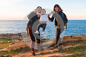 Women with a child on the coast of Mount Jaizkibel in Fuenterrabia, Basque Country photo