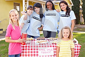 Women And Children Running Charity Bake Sale photo