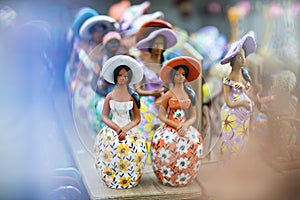 Women of clay dolls. Beautiful clay women. Concept of women of clay.