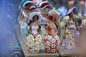 Women of clay dolls. Beautiful clay women. Concept of women of clay.