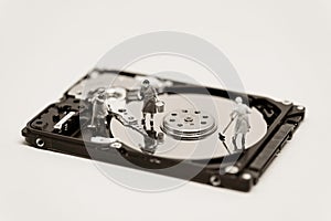 Women clean up a hard drive. Technology concept. Macro photo