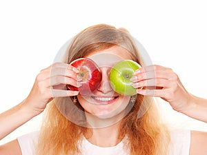 Women closing with eyes two apples. Isolated on white background