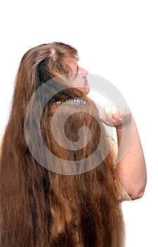 Women combing her beautiful long red hair