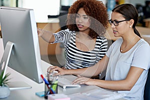 Women, computer and collaboration in office with explain for communication, project review and discussion. Female worker