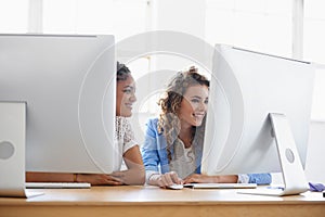 Women, computer or happy people in office talking, chatting or speaking of gossip or online news together. Internet