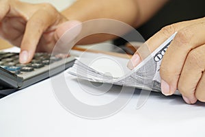 Women counting dollar bills, finances and accounts