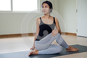 Women are doing seated twist exercises for health and a firmer body. yoga concept