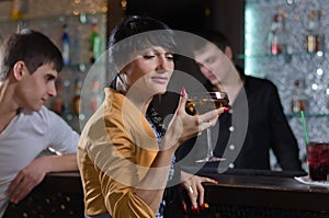 Women drinking at a pub counter