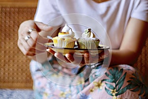 Women eating cupcakes in breakfast food