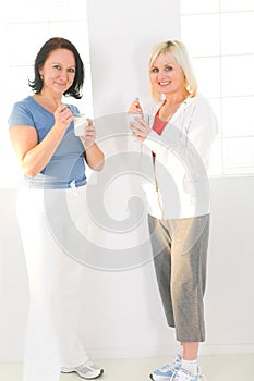 Women eating yoghurt