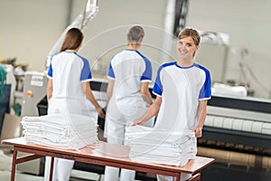 Women employed agree ironing textiles