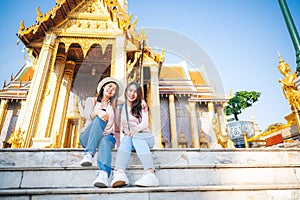 Women enjoy travel temple in Thailand