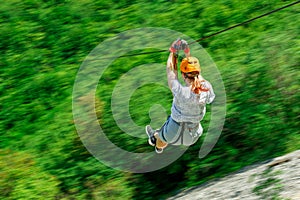 Women Enjoying Thrilling Zipline Experience, Embracing the Exhilaration of Activity-filled Vacation photo