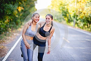 Women exercise happily for good health. Exercise concept