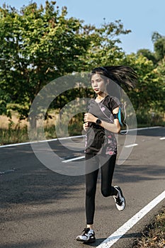 Women exercise by running on the road