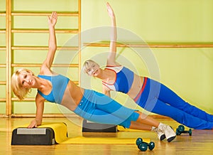 Women exercising in fitness club